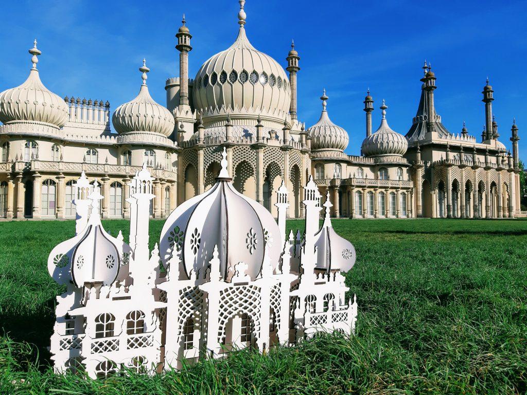 Miniature laser-cut Royal Pavilion in front of the real Royal Pavilion